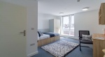 student room with bed, chair, and window at The Croft, Derby
