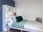 Cozy single bedroom with stylish decor at Plymouth Cross House