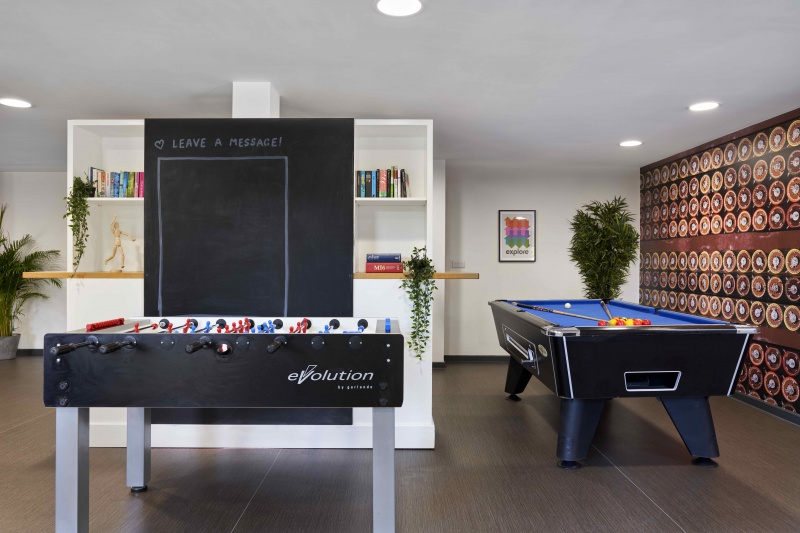 ASA Briggs House games room with foosball and pool tables