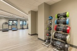 On-site gym at Lumis Student Living featuring various exercise equipment.