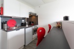 Share kitchen with seating and storage