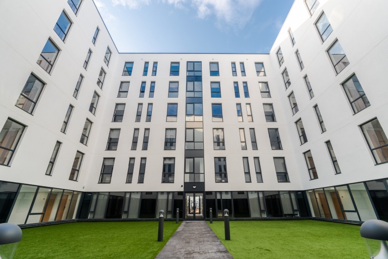 Relaxing outdoor courtyard at Unity Square student accommodation in Liverpool