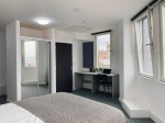 Single room ensuite with bed, study desk and storage, with window, Sheffield