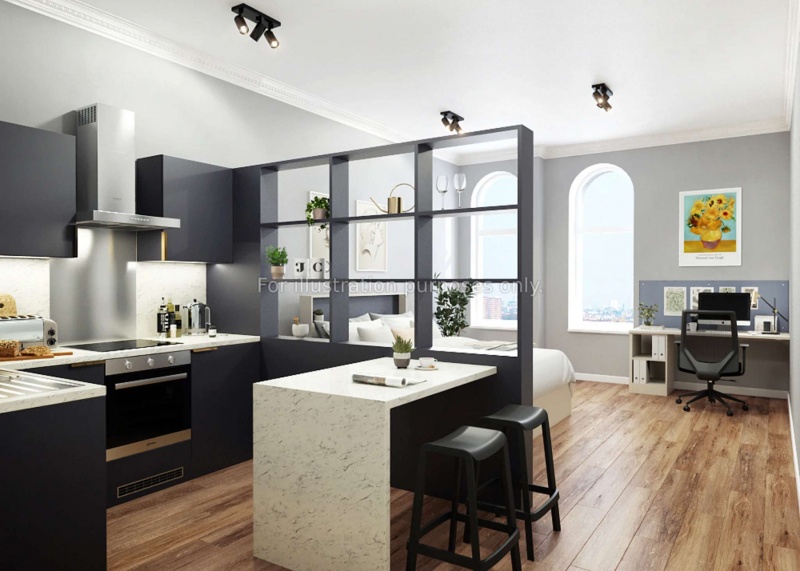 A modern studio kitchen with sleek appliances and a small dining area, 26 Great George Street, Leeds