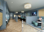 A cozy communal lounge area with comfortable seating and a large flat-screen TV at 26 Great George S