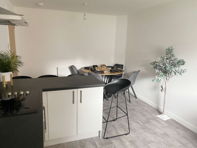 Shared kitchen area at Park Village, Sheffield. Fully equipped with modern appliances.