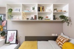 A private en-suite room at Stratford One student accommodation with a comfortable bed, study desk