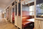 Modern study spaces at Stratford One student accommodation with desks, chairs, and ample lighting fo