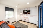 Agnes Jones House Communal lounge area with TV for students 