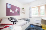 Bright bedroom with a window at Station Court student accommodation, London
