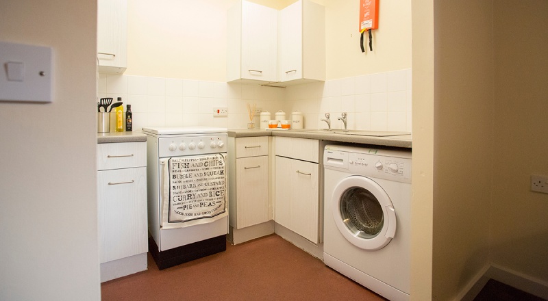 Kitchen corner at double comfortable bed with a study desk and window at Bedford Street South, Liver