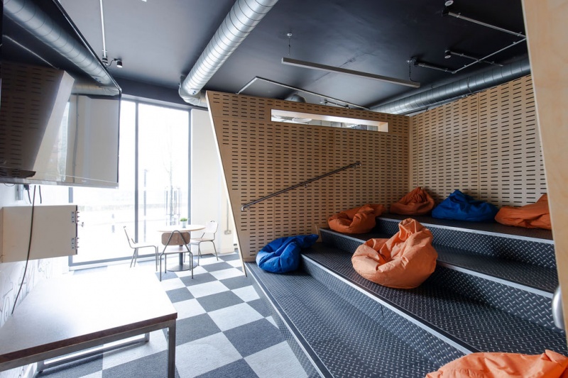 Comfortable communal lounge with seating and a large TV at Lumis Student Living, Leicester