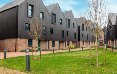 The exterior of Elmstead Place student accommodation, showing the building and landscaped surroundin